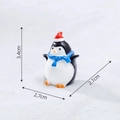 Miniature Christmas penguin figurine with red hat and blue scarf, 3.4cm resin ornament - Penguin with Blue Scarf
