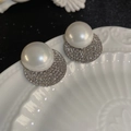 Elegant silver bow earrings with round white pearls and sparkling diamond-studded base - E5418 Silver Needle - Silver