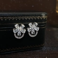 Elegant silver flower stud earrings featuring five teardrop zircons on a black leather box - E5486 Silver Needle - Silver