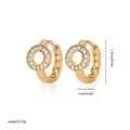 Detail view of gold-plated hoop earrings with zircon, 1.5cm height and 1cm diameter size - EH251