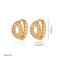 Macro shot of gold-plated marquise earrings with zircon inlay, 1.5cm by 0.9cm size details - Eh249