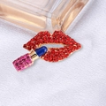 Elegant red rhinestone lips and lipstick brooch pin with sparkling crystal accents - Red Lips and Lipstick Style