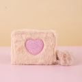 Detailed view of pink plush coin purse with glitter heart embroidery and pom-pom keychain - Beige
