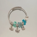 Detail of silver twisted rope bracelet with elephant pendants and teal crystal beads - New Fashion Style (B1077-16)