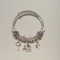 Close-up of elephant and heart charms on a silver beaded charm bracelet with purple beads - New Fashion Style (B1077-14)