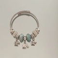 Detail of silver double-layered steel bangle with blue glass beads and elephant pendants - New Fashion Style (B1077-12)