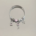 Silver twisted cable bracelet with pink star gems and key charm accents - Silver Pink Star Key Bracelet
