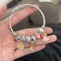 Silver twisted cable bracelet with daisy, bow, and pink pig charms for women - Alice Rabbit Bracelet
