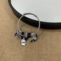 Silver steel wire bracelet featuring a Kuromi charm and heart pendant on burlap - Black New Cartoon Character Bracelet
