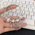 Silver bead bracelet with pink charms, four-leaf clover, and gemstone dreamcatcher - Pink Spring Dreamcatcher