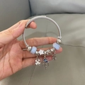 Silver charm bracelet with blue beads, dreamcatcher and floral pendants for women - Blue Spring Dreamcatcher