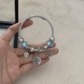 Silver steel cable charm bracelet with blue glass beads and Tree of Life pendant - Butterfly Tree of Life Bracelet