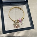 Golden twisted steel wire bracelet with evil eye charm and pink glass beads - Gold Circle Pink Evil Eye Bracelet