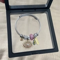 Silver steel cable bracelet with evil eye charm and pink beads in a display box - Steel Circle Pink Evil Eye Bracelet