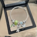 Silver twisted chain bracelet featuring a green bead, rabbit charm and love heart pendant - Green Mr. Rabbit Bracelet