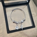 Silver beaded charm bracelet with floral and fairy pendants in a protective display box - White Flower Fairy Bracelet