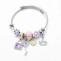 Zilveren bedelarmband met hart-, sleutel- en kroonhangers voor trendy damesmode-sieraden. - Paarse Bloemen Hart