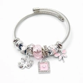 Elegante zilveren staaldraad armband met roze hart, zwaan en vlinder bedeltjes - Roze Zwaan Libel
