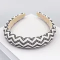 Padded headband featuring black and white geometric beadwork and a beige lining - Style B - Black & White