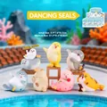 Vibrant sea lion figurine set in different dance poses with premium matte finish texture - C102 Dancing Leopard Box 6 / Random One