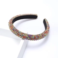 Padded rhinestone headband in colorful crystal finish on white display stand - Colorful