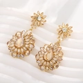 Elegant champagne gold floral drop earrings with water drop crystals for bridal wear - Champagne