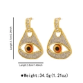 Detailansicht der goldene Evil Eye Perlenohrringe mit Strassbesatz und Größenangaben - Gold