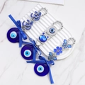 Three-piece evil eye hanging set with owl, butterfly, and Om symbols in blue glass - OM Evil Eye Butterfly Ornament (111)