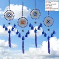 Turkish Blue Eye wind chime with silver sun pattern and deep blue silk tassels - Silver Sun Disk Evil Eye Style (L1007)