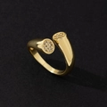 Close-up of minimalist golden open ring with shimmering micro-pave stone detail - Minimalist Fashion Ring (K)