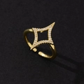 Close-up view of a minimalist gold star-shaped open ring with cubic zirconia stones - Minimalist Fashion Ring (Q)