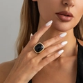 Retro cocktail ring with a large black rectangular stone and golden rope border - Light Gold + Black (00986)