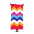 Quick-dry beach towel with colorful chevron pattern held by a model in front view - Colorful Chevron Wave (Style 5)