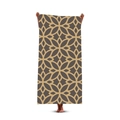 Quick-dry beach towel with brown and gold geometric floral print held by a model - Brown Gold Geometric Floral (Style 6)