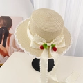 Straw sun hat with white lace trim, cream ribbon bow, and red strawberry charms - Beige Raspberry Flat Top