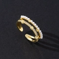 Close-up of gold double-layer ring with white pearls and sparkling cubic zirconia stones - Creative Zircon (Style 6)