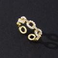Detailed close-up of a gold-plated adjustable ring with white pearls and zircon accents - Butterfly Open (Style 10)