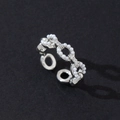 Macro shot of chain-link ring with micro-pave zircons and pearls on silver band - Geometric Open (Style 11)