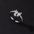 Macro shot of silver butterfly ring with pear-cut zircon stones and adjustable band - Luxury Style (Style 15)