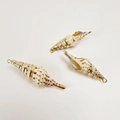 Close-up of three natural seashell charms with gold-plated edges for DIY jewelry making - Brown Spotted Pointed Conch