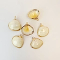 Set of 6 natural seashell charms with gold plated edges for DIY jewelry making - Yellow Heart Glazed Shell