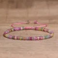 Adjustable woven bracelet featuring colorful natural stone beads and gold spacers - 109 Rainbow Tourmaline