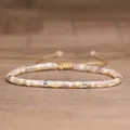 Adjustable hand-woven bracelet with off-white square shell beads and silver metal spacers - 105 Yellow Horseshoe Snail [silver]