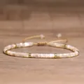 Adjustable woven bracelet with white shell square beads and golden metal spacers - 106 Yellow Horseshoe Snail [golden]