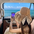 Chic khaki wide-brim straw sun hat with large elegant bow for beach vacation - Two-Tone Bowknot Khaki