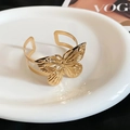 Modern wide open cuff bracelet with gold hollow butterfly engraving and metallic shine - Hollow Butterfly (21# Eco-Gold)