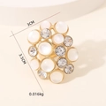 Eleganter Goldring mit Katzenaugenstein und Kristallen, 3 cm breites Blumen-Design - Einheitsgröße / Vergoldet