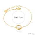 Golden stainless steel double chain bracelet with a white shell pendant in 17+3cm length - Gold MOP Round Style (BR27430AG)