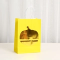 Golden pumpkin kraft paper gift bag with white twisted handles for Thanksgiving and autumn - 21x15x8cm / Yellow