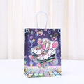 Retro disco gift bag with roller skates and neon patterns on purple galaxy background - Purple Roller Skates With Wings Design (540-1) / H21*L15*W8CM
